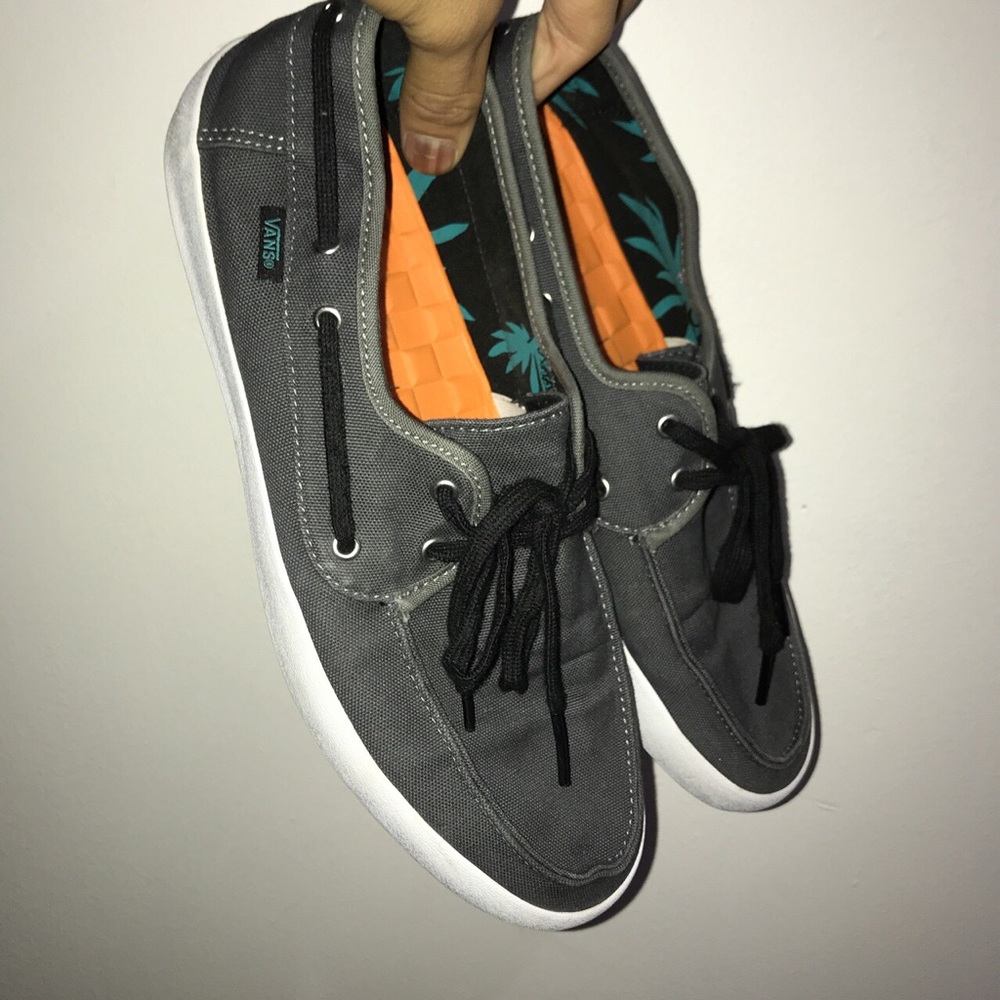 Gray vans in good condition and comfortable.